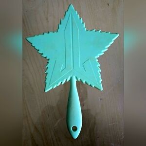 Jeffree Star Mint (soft touch) handheld mirror.